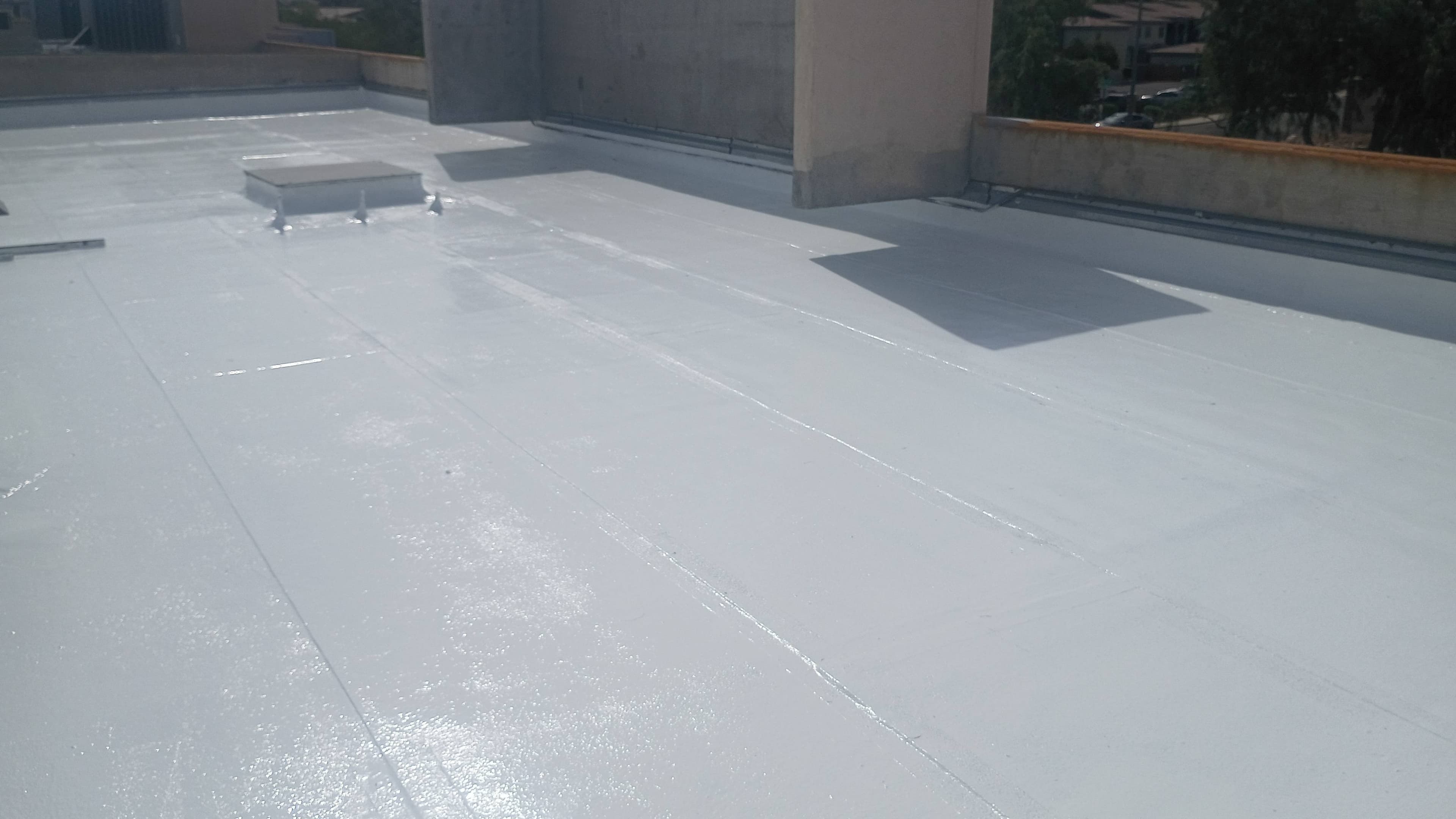 Project Flat Roof Coating with Silicone Elastomeric in Action image